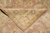Load image into Gallery viewer, Close-up of a patterned rug with intricate designs in earthy tones.