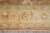 Load image into Gallery viewer, Close-up of a patterned rug with intricate designs on a wooden floor.