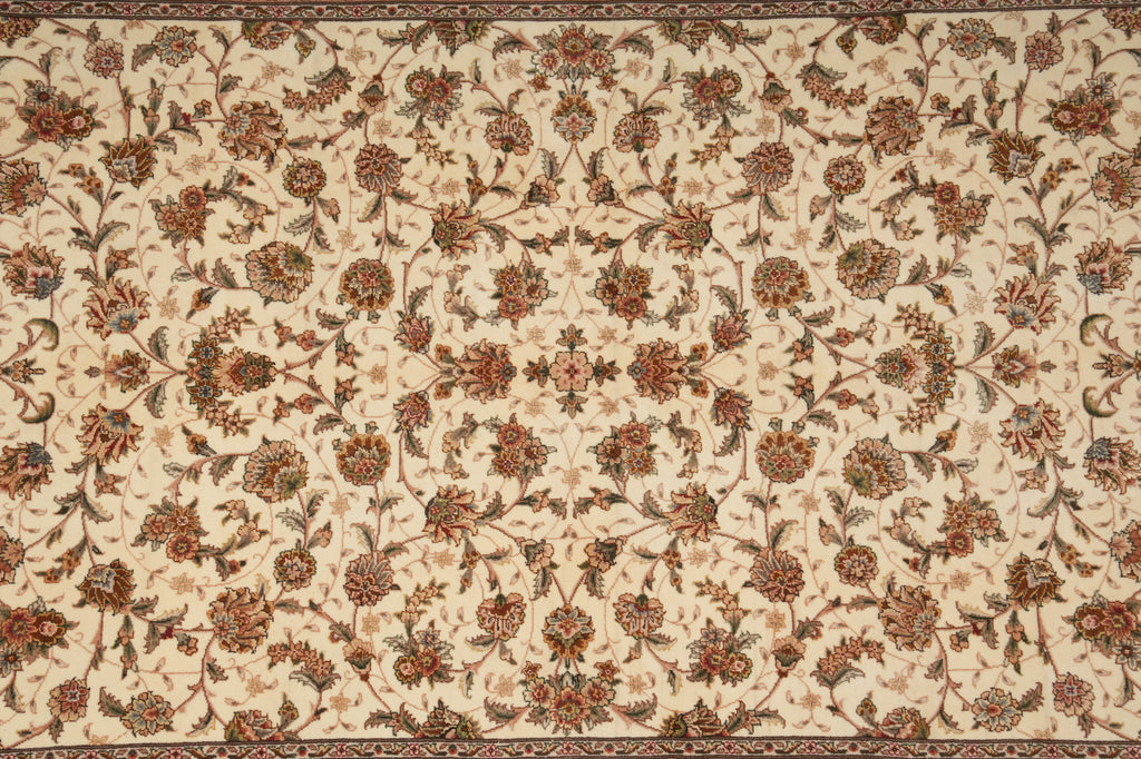 Patterned rug with floral design on a beige background