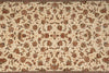 Load image into Gallery viewer, Patterned rug with floral design on a beige background