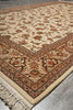 Load image into Gallery viewer, Close-up of a patterned rug with intricate designs on a neutral background
