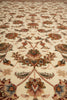 Load image into Gallery viewer, Close-up of a patterned rug with intricate designs on a beige background