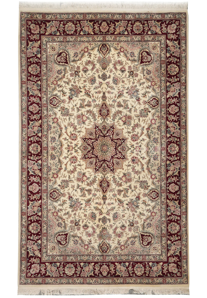 Decorative rug with intricate patterns on a white background