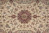 Load image into Gallery viewer, Close-up of a patterned rug with intricate designs on a beige background