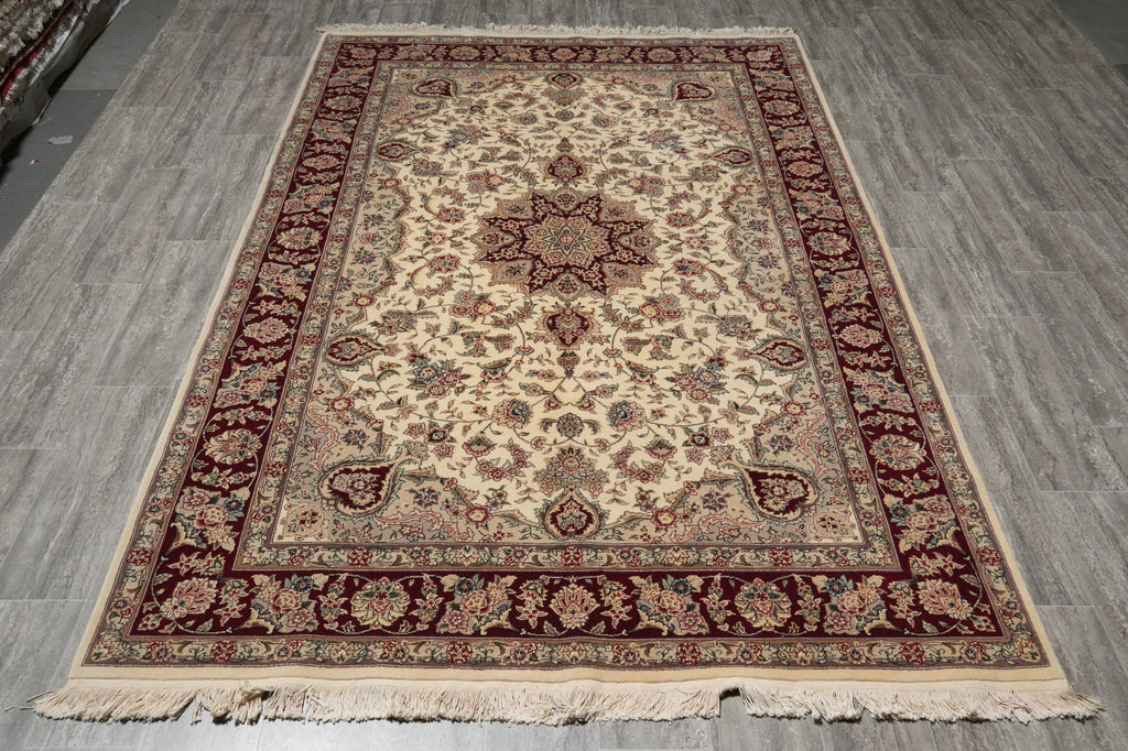 Decorative rug with intricate patterns on a wooden floor