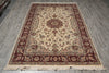 Load image into Gallery viewer, Decorative rug with intricate patterns on a wooden floor