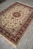 Load image into Gallery viewer, Decorative rug with intricate patterns on a wooden floor
