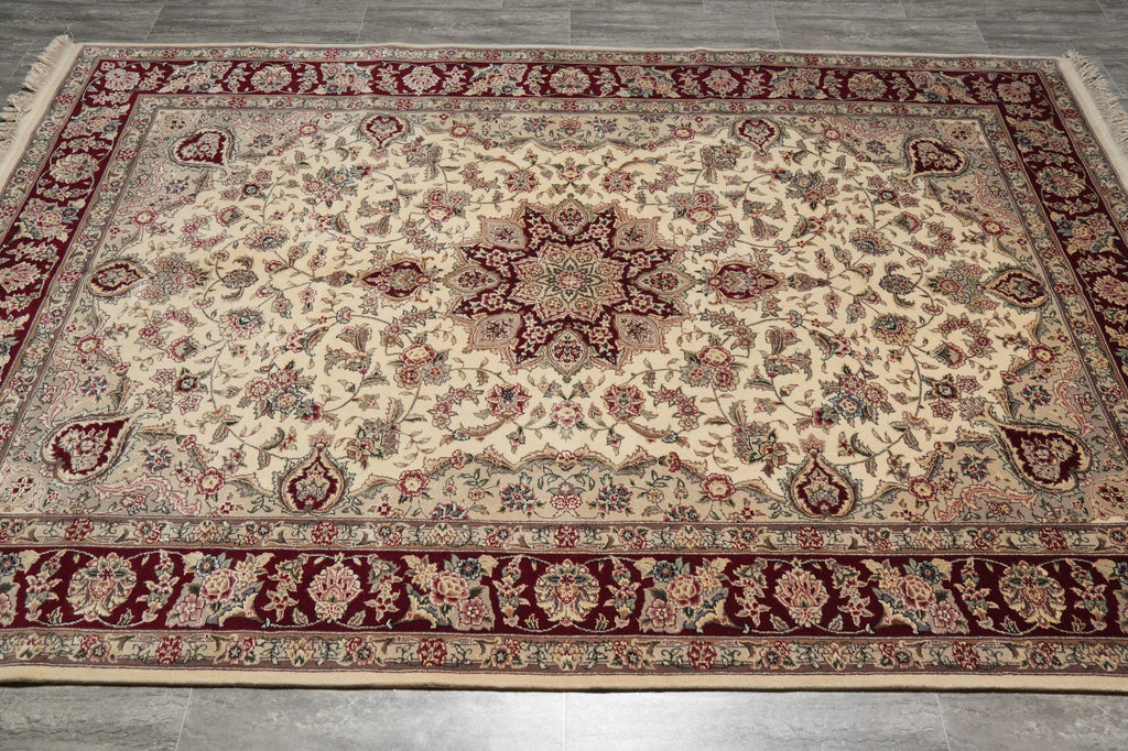 Decorative rug with intricate patterns on a wooden floor