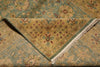 Load image into Gallery viewer, Close-up of a patterned rug with green and brown colors