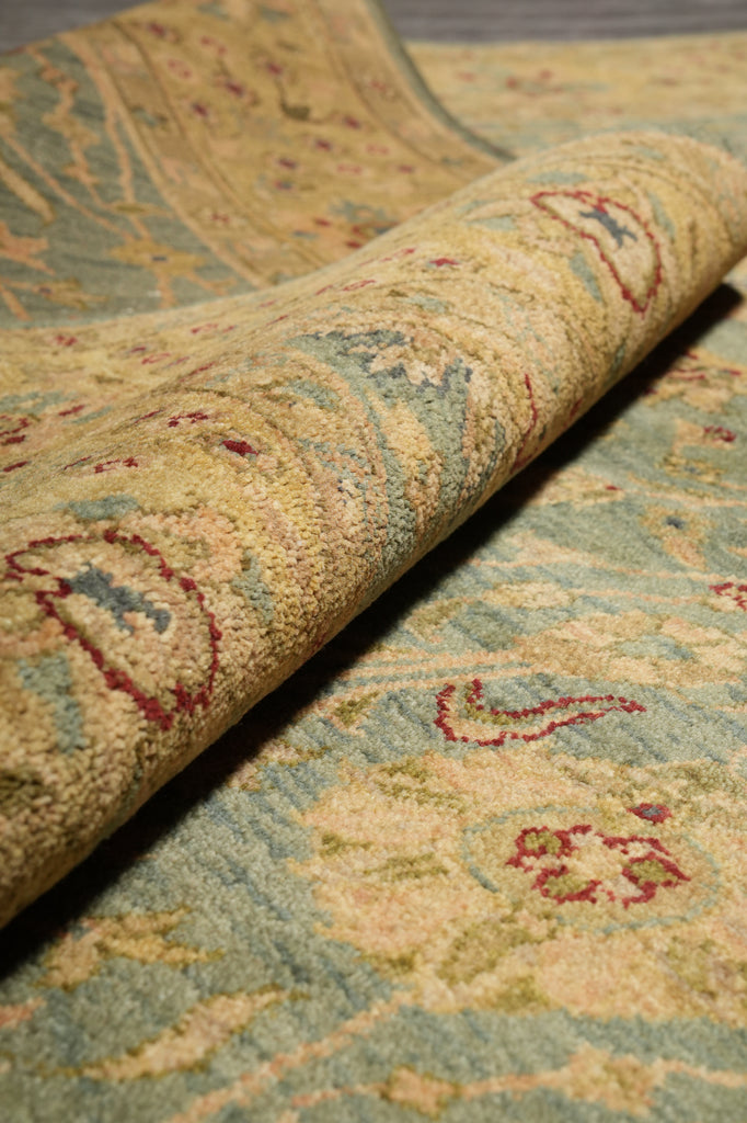 Close-up of a patterned rug with intricate designs.