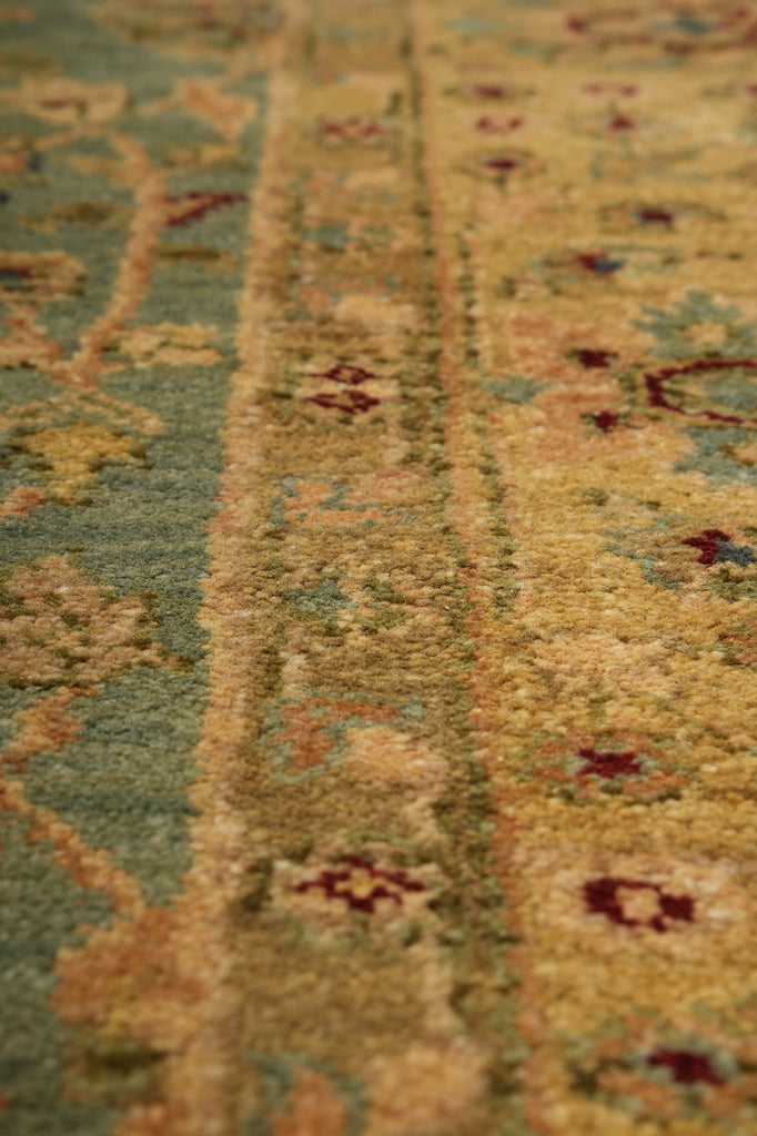Close-up of a patterned rug with intricate designs.