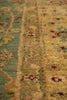 Load image into Gallery viewer, Close-up of a patterned rug with intricate designs.