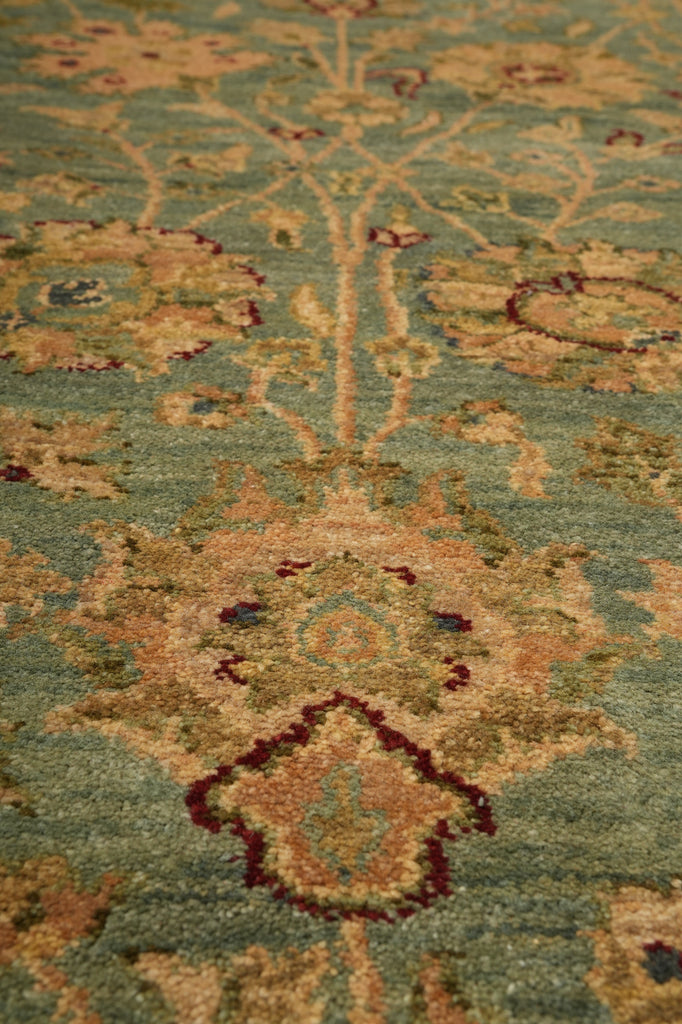 Close-up of a patterned rug with intricate designs.