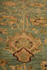 Load image into Gallery viewer, Close-up of a patterned rug with intricate designs.
