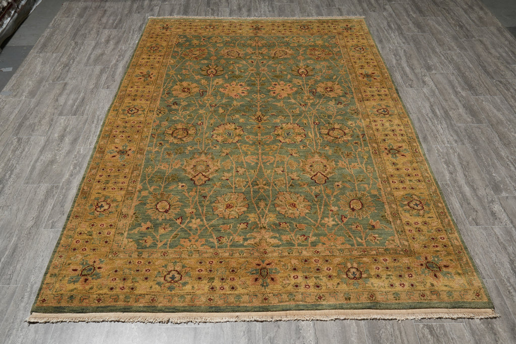 Decorative rug with floral patterns on a wooden floor