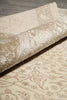 Load image into Gallery viewer, Close-up of textured fabric with intricate patterns on a wooden surface