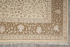 Load image into Gallery viewer, Close-up of a patterned beige rug on a wooden floor