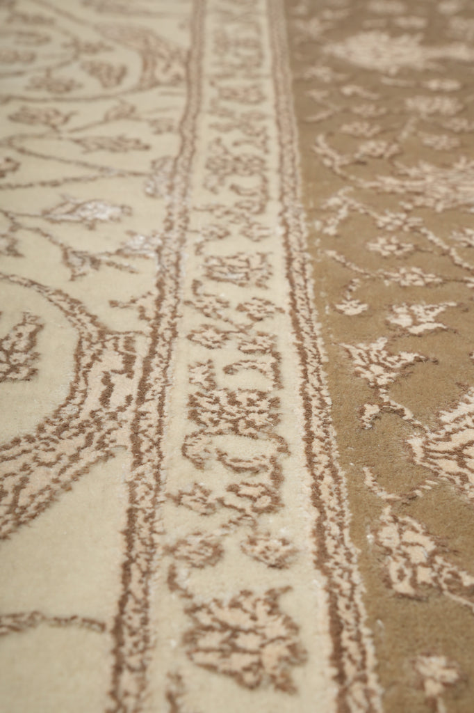 Close-up of a patterned rug with intricate designs.