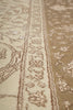 Load image into Gallery viewer, Close-up of a patterned rug with intricate designs.