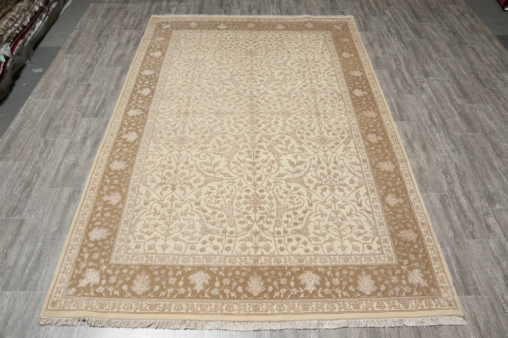 Beige patterned rug on a wooden floor