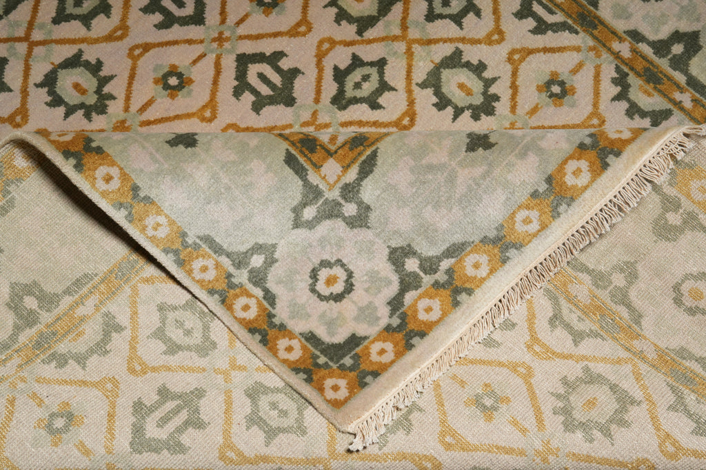 Close-up of a patterned rug with geometric designs.