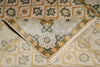 Load image into Gallery viewer, Close-up of a patterned rug with geometric designs.