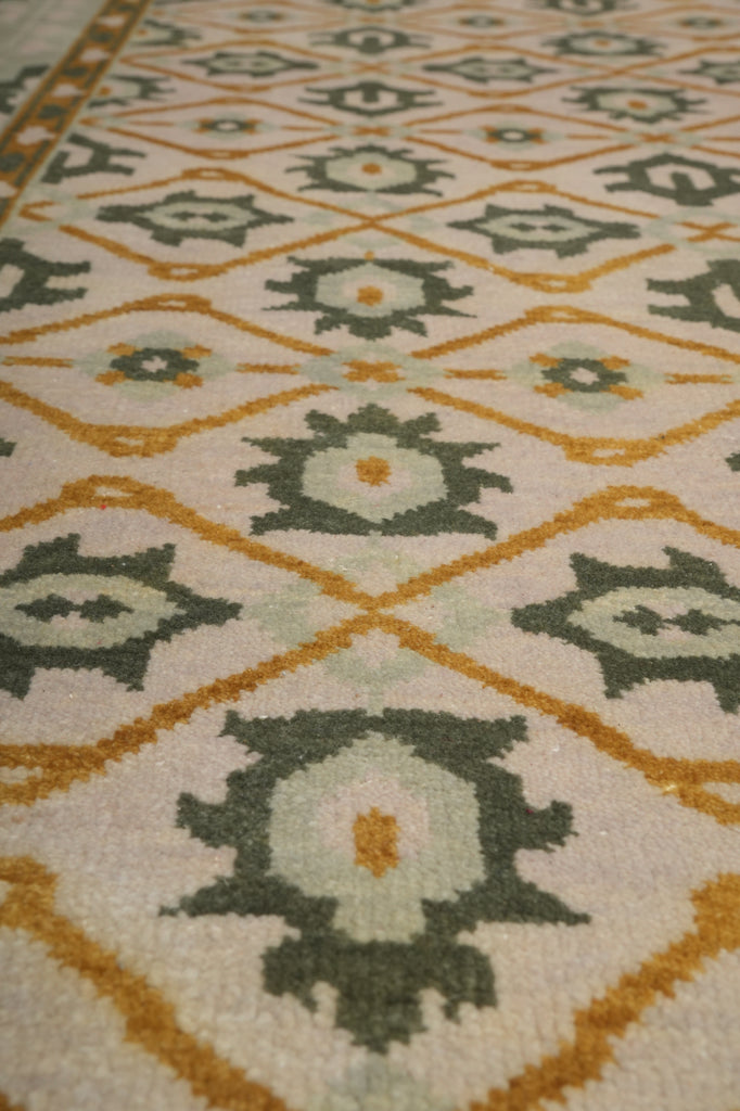 Close-up of a patterned rug with geometric design