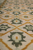 Load image into Gallery viewer, Close-up of a patterned rug with geometric design