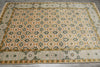 Load image into Gallery viewer, Patterned rug with geometric design on a wooden floor