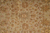 Load image into Gallery viewer, Close-up of a patterned rug with intricate designs in earthy tones.