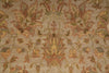 Load image into Gallery viewer, Close-up of a patterned carpet with intricate designs in earthy tones.