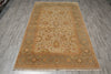 Load image into Gallery viewer, Decorative rug with intricate patterns on a wooden floor