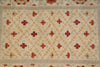 Load image into Gallery viewer, Decorative rug with geometric pattern and red floral elements on beige background