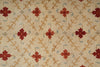 Load image into Gallery viewer, Patterned fabric with red floral designs on a beige background