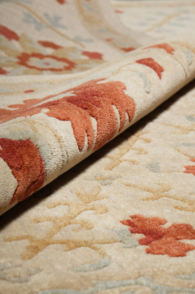 Close-up of patterned fabric with red and beige colors