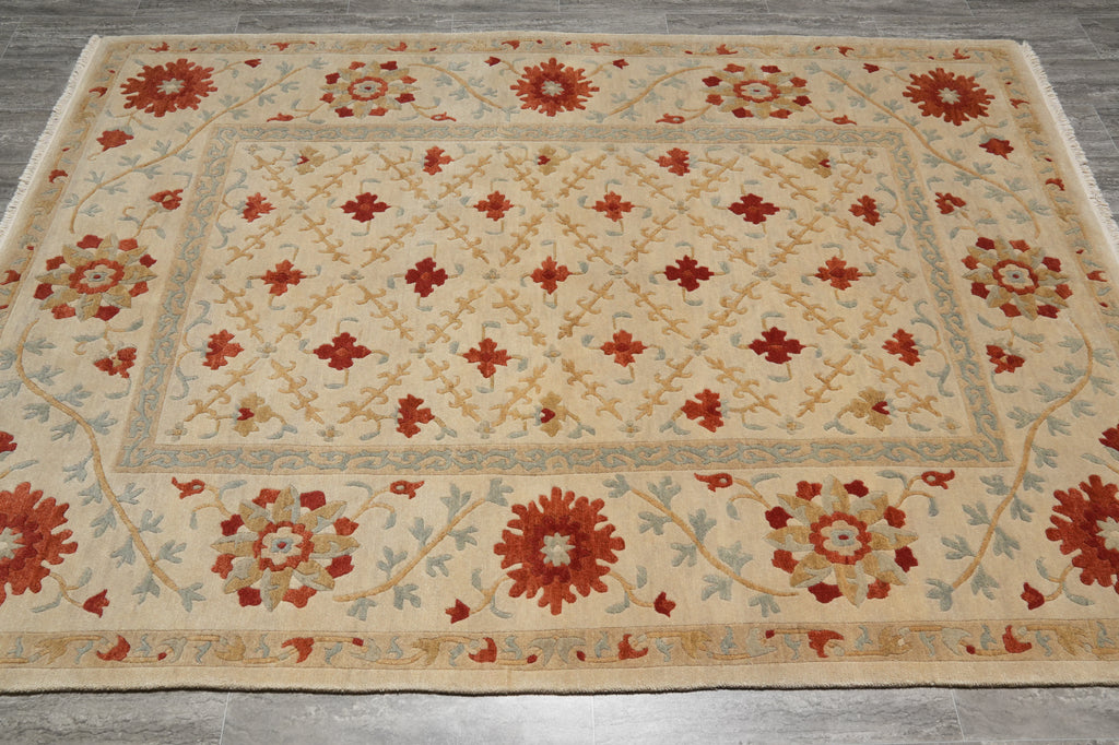 Decorative rug with floral patterns on a wooden floor