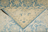 Load image into Gallery viewer, Close-up of a patterned rug with blue and beige colors