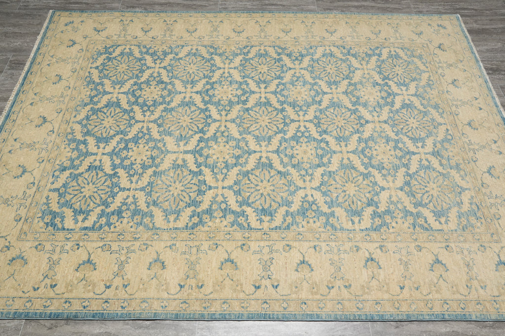 Patterned rug on a wooden floor
