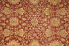 Load image into Gallery viewer, Close-up of a patterned red rug with intricate designs