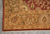 Load image into Gallery viewer, Close-up of an ornate rug with intricate patterns on a gray floor.