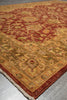 Load image into Gallery viewer, Decorative rug with intricate patterns on a neutral floor