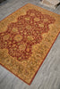 Load image into Gallery viewer, Decorative rug with intricate patterns on a wooden floor
