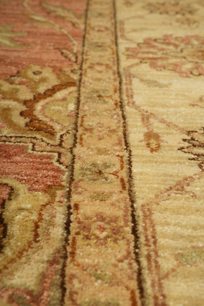 Close-up of an ornate rug with intricate patterns and colors.