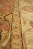 Load image into Gallery viewer, Close-up of an ornate rug with intricate patterns and colors.