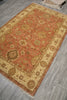 Load image into Gallery viewer, Decorative rug with intricate patterns on a wooden floor