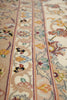 Load image into Gallery viewer, Close-up of a patterned fabric with floral and geometric designs.