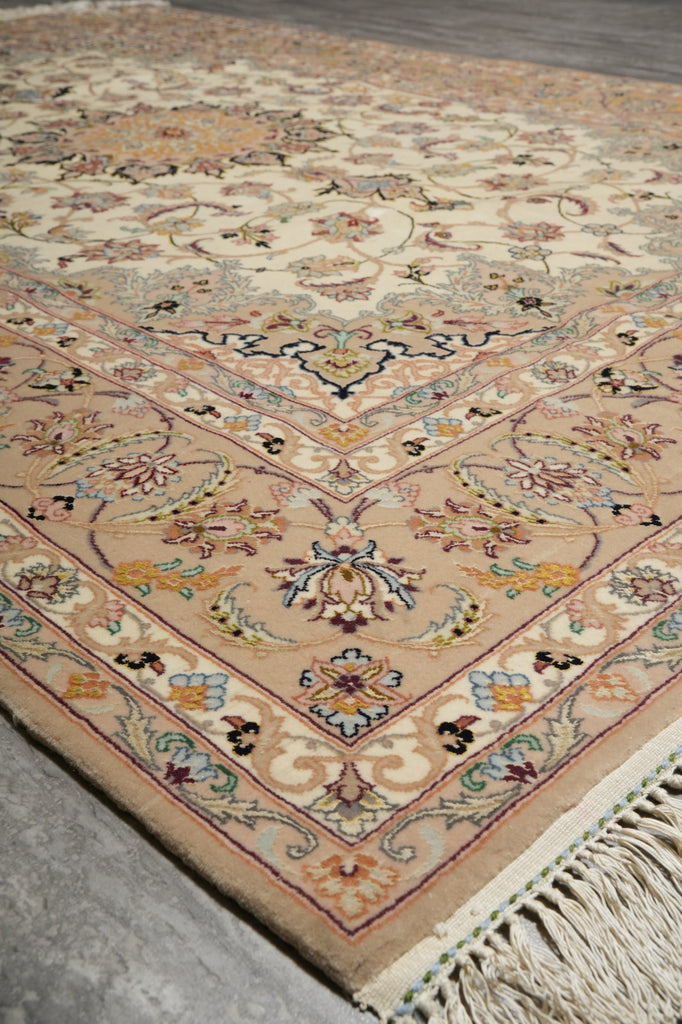 Decorative rug with intricate patterns on a concrete floor