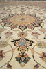 Load image into Gallery viewer, Close-up of an intricately designed floral patterned rug.