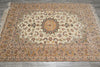 Load image into Gallery viewer, Decorative rug with intricate patterns on a wooden floor