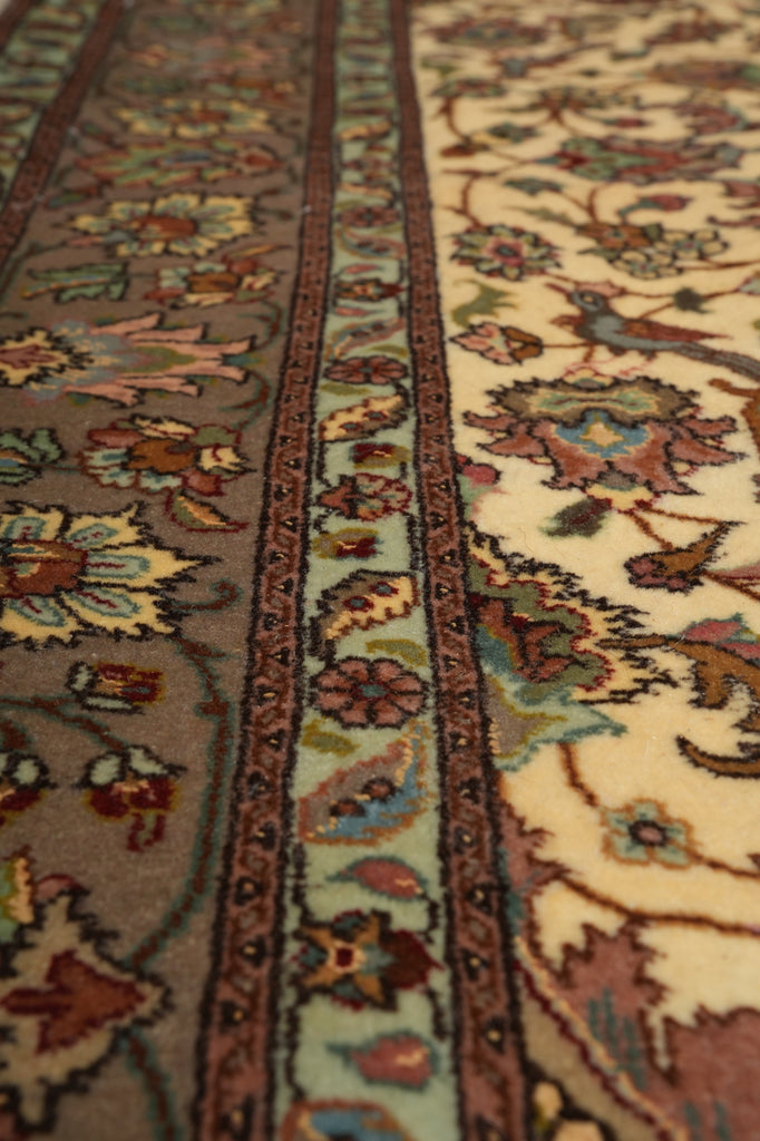 Close-up of a patterned rug with intricate designs.